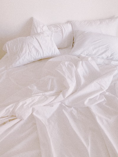 White pillows on the bed
